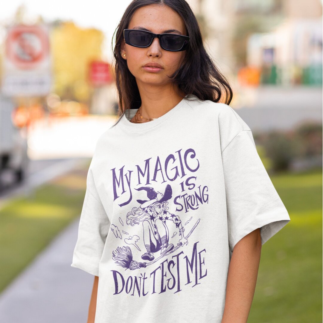 Magic Is Strong oversized tee front graphic – Fourth Dimension Club