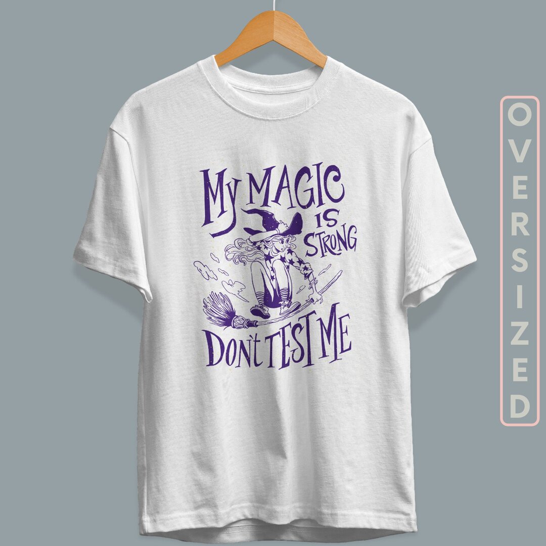 Magic Is Strong Unisex Oversized T-Shirt — back view