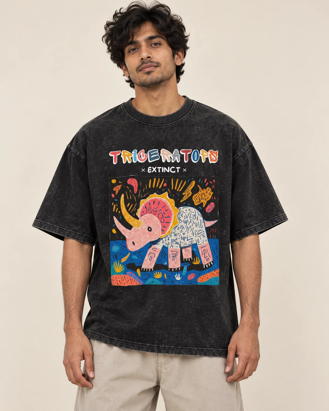 Triceratops black acid wash oversized T-shirt from the Ancient Archives collection by Fourth Dimension Club, front view on model