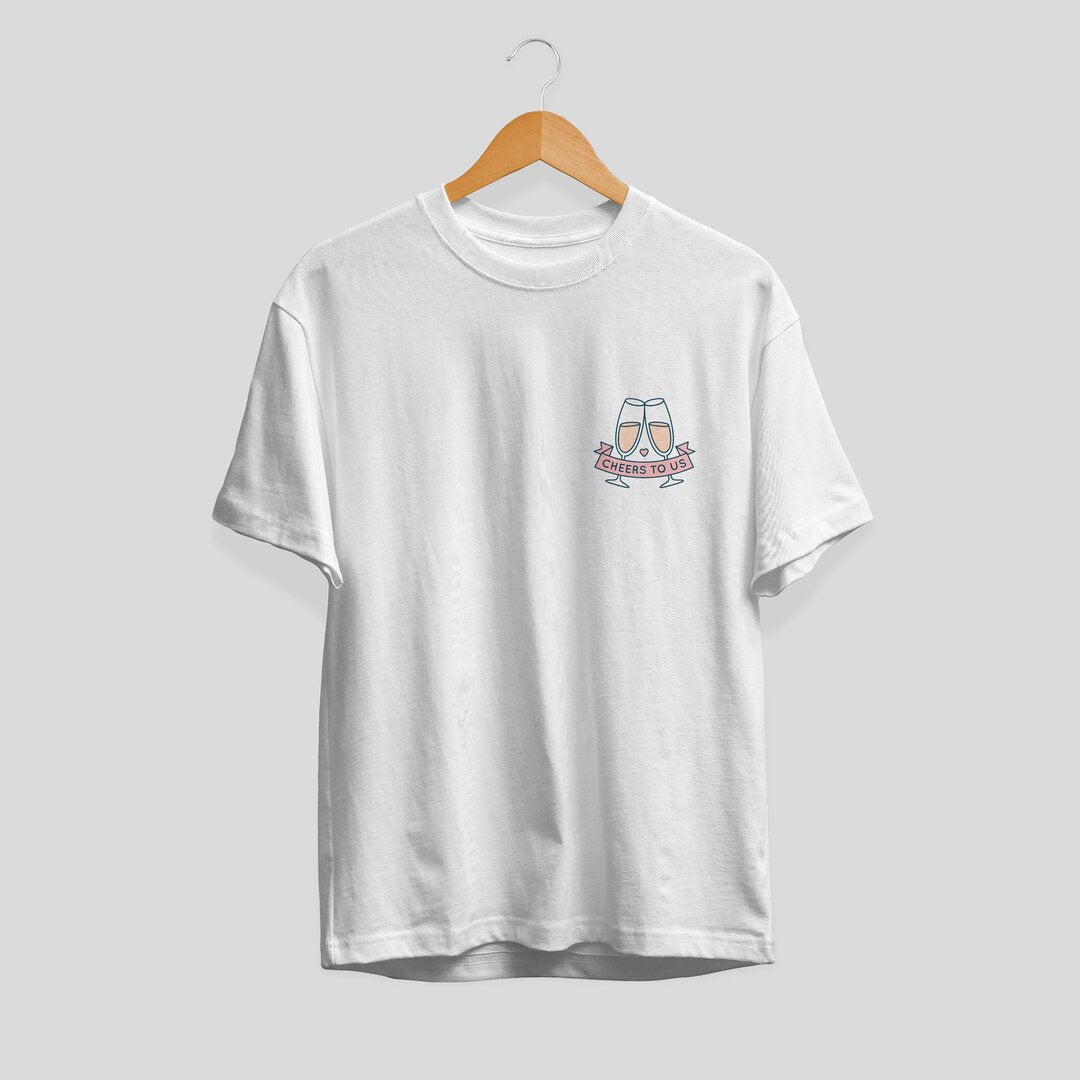 Cheers To Us pocket graphic tee front print – Fourth Dimension Club